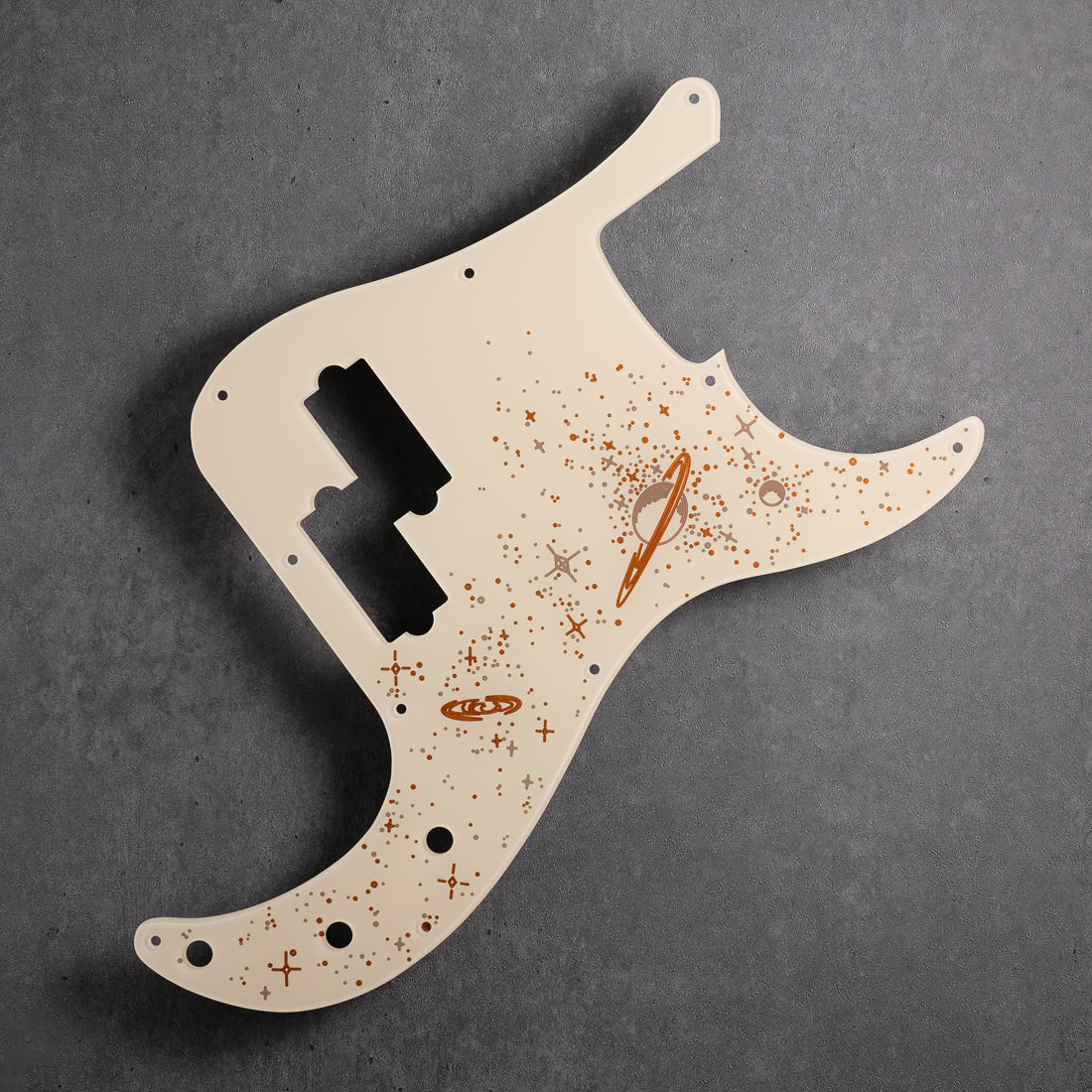 Space Oddity - Precision Bass Pickguard - 10-hole - on Ivory Plexi